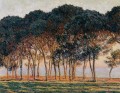 Bajo los pinos al final del día Claude Monet